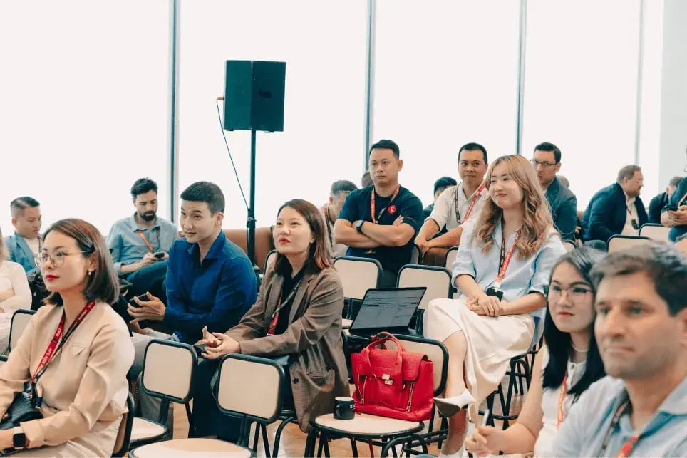 A group of event attendees representing the value of FAIRNESS.